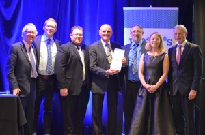 Robert Haller right, presented the award to the Liquiforce team (L-R) Alec Turnbull, Brandon Windsor, Kim Lewis, Bill Thorpe, Darcy Warren, Kim Lewis, centre. Katherine Balpataky, far right.