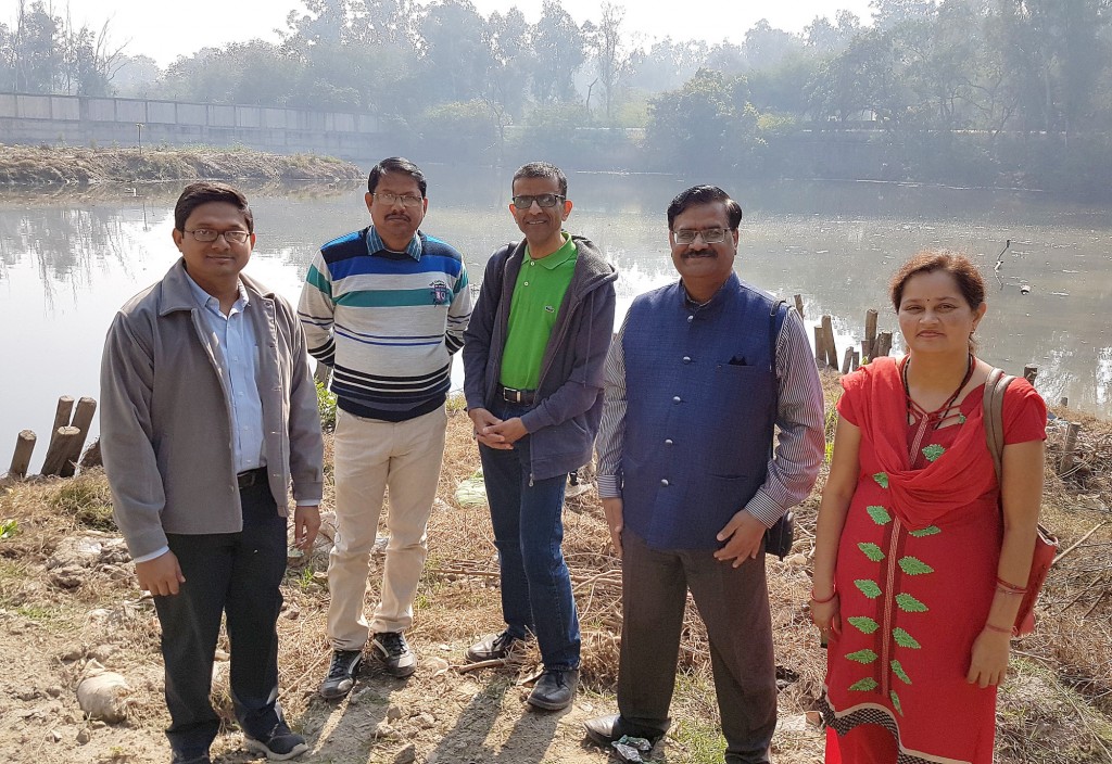 Left to Right: Dr. Tuhin Banerji, Scientist, CSIR-NEERI; Mukesh Kumar, Junior Engineer, Delhi Govt.; Dr. Rajesh Seth, University of Windsor; Dr. S.K. Goyal, Scientist and Head (Delhi Zonal Laboratory) CSIR – NEERI; and Rashmi Misra, CSIR-NEERI pose in front of the project site at Sonia Vihar Lake in India.